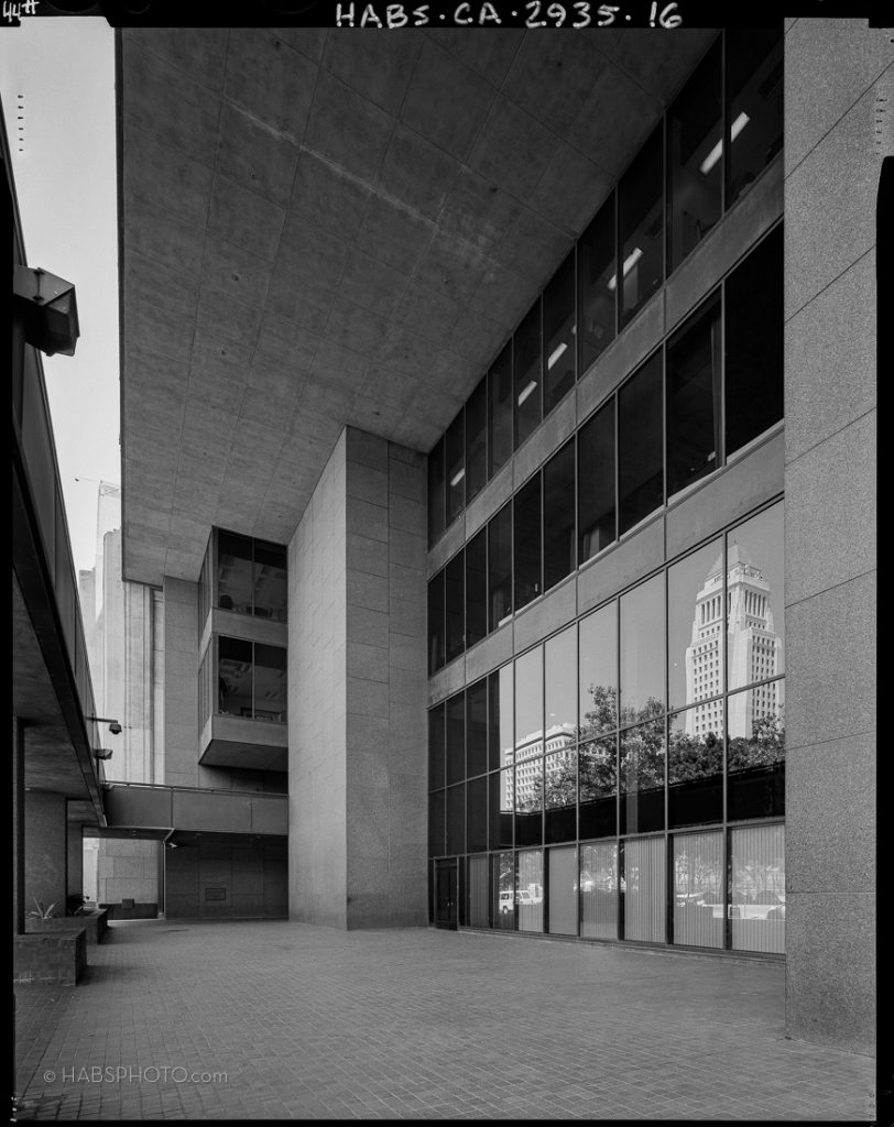 Historic American Buildings Survey (HABS) large format 4x5 photograph in black and white of the Los Angeles Times Mirror Building with a reflection of Los Angeles City Hall on the window.