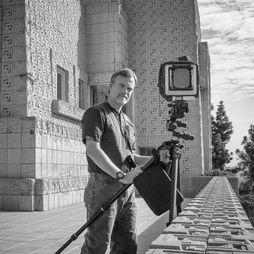 HABS Photographer Stephen D. Schafer documenting the Ennis House designed by architect Frank Lloyd Wright.