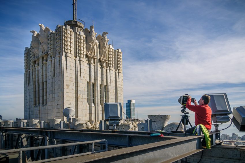 A HABS Photographer taking a large format photograph on the roof of the Pacific Telephone and Telegraph building in San Francisco.